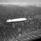 LZ 129 Hindenburg built by the Zeppelin company flies over Manhattan on May 6, 1937. A few hours later, the ship burst into flames in an attempt to land at Lakehurst, New Jersey