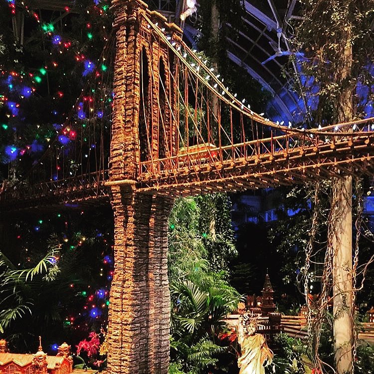 The "Barklyn Bridge". It's the 24th annual Holiday Train Show at the NY Botanical Garden. Step into a mini-NYC made out bark and other natural materials where enchanting model trains zip past 150 iconic buildings with familiar sights such as the Brooklyn Bridge, Statue of Liberty and Rockefeller Center. The Holiday Train Show is ongoing until January 18, 2016. The All-Garden Pass Pricing (Garden access + train show) is $30 for adults on weekends and holidays.  The NY Botanical Garden is located at 2900 Southern Boulevard Bronx, NY. 
NYC livin' one weekend at a time. Checkout #Discoverue.com for more ideas. Photo by @cutenesscurator.