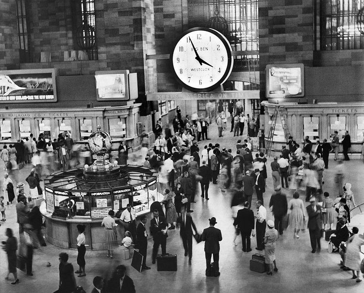 Aug. 7, 1959: A 15-foot clock hung over the bustle of Grand Central Terminal, sporting an advertisement for its maker, Westclox (appearing on Page 19 of this issue). The clock would bear the logos of several companies through the years; eventually, it was removed.