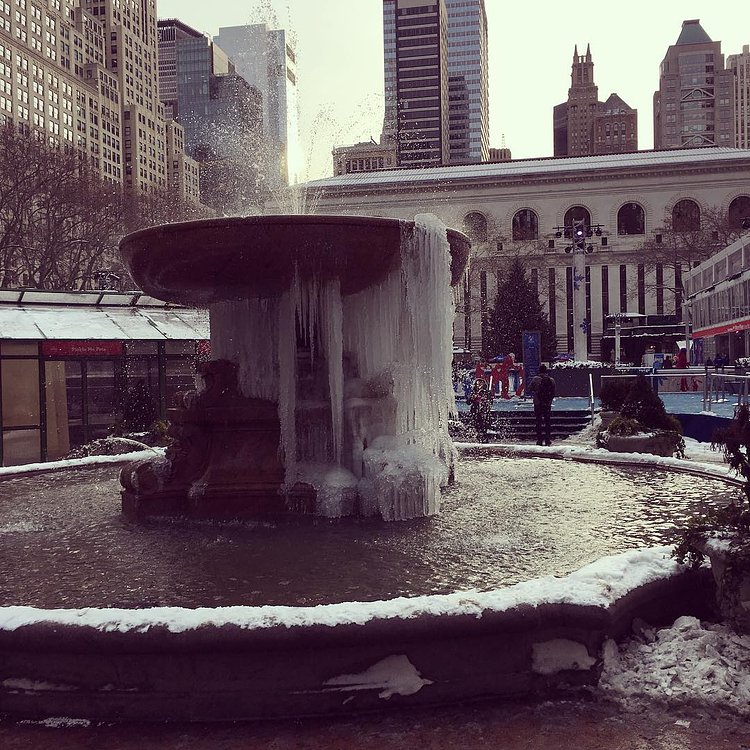 We call this 1/4 frozen. #bpfrozenfountain #gettingcloser #wintervillage #brrrryantpark