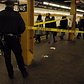 2000's: A 14-year-old boy was reportedly on his way to school when he was stabbed at the subway station at West 145th St. and St. Nicholas Avenue in 2007. Police tape cordons off the scene, pictured here.