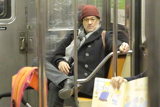 You're taking up two seats sir - Tom Hanks sits back as he rides the New York subway  http://t.co/Nq8Me2sBtJ http://t.co/gBNIBdcnAB