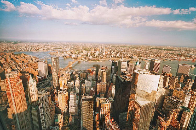 One World Trade Center Observatory View - New York City Skyline - Brooklyn Bridge and Manhattan Bridge | The views from the new observatory at the top of One World Trade Center (still lovingly referred to as the Freedom Tower ) are nothing short of breath-taking.

Taken yesterday over the span of an hour as the sky and the light changed drastically.

You can practically see the curvature of the earth from up there.

----


 Tons of information about my <a href="http://www.amazon.com/gp/product/1440339589/ref=as_li_tl?ie=UTF8&amp;camp=1789&amp;creative=9325&amp;creativeASIN=1440339589&amp;linkCode=as2&amp;tag=nyththle0e-20&amp;linkId=ER6GYT5FRYNMEPLF" rel="nofollow">New York photography book</a> with sample pages (including where to order and what stores are carrying it) here:

<a href="http://nythroughthelens.com/post/92873566010/ny-through-the-lens-the-book-i-am-super" rel="nofollow">NY Through The Lens: A New York Coffee Table Book</a>
---


View my New York City photography at my website <a href="http://nythroughthelens.com/" rel="nofollow">NY Through The Lens</a>.

View my Travel photography at my travel blog: <a href="http://travelinglens.me/" rel="nofollow">Traveling Lens</a>.

Interested in my work and have questions about PR and media? Check out my:

<a href="http://nythroughthelens.com/about" rel="nofollow">About Page</a> | <a href="http://nythroughthelens.com/PR" rel="nofollow">PR Page</a> | <a href="http://nythroughthelens.com/media" rel="nofollow">Media Page</a>
