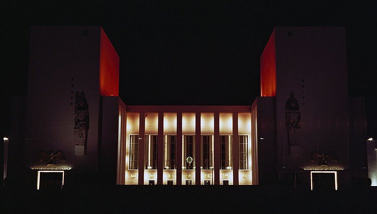 The United States Pavilion lit up at night.
