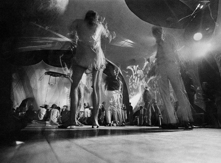 July 4, 1967: Psychedelic times at the Electric Circus, on St. Mark’s Place in Manhattan, where one might observe “a model in a purple and silver polka dot jump suit” sailing into “the arms of a man dressed as a gorilla,” as one reporter did in The Times later that year. “Then, as the walls crawled with protoplasmic blobs of colored light throbbing with the beat, the model and the gorilla began to frug.” The frug (pronounced froog) being one of many dance crazes sweeping the nation.