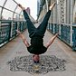 A yoga headstand on the Manhattan Bridge
