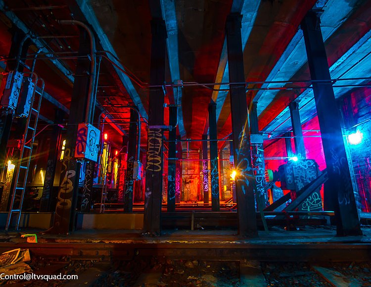 At the very end of the yard, the tracks dead end at the wall.