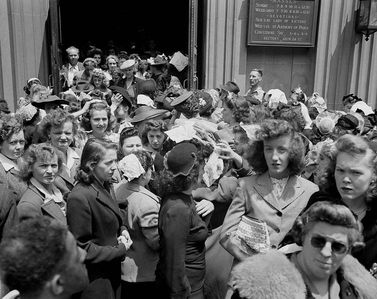 Worshippers outside St. Vincent de Paul’s church