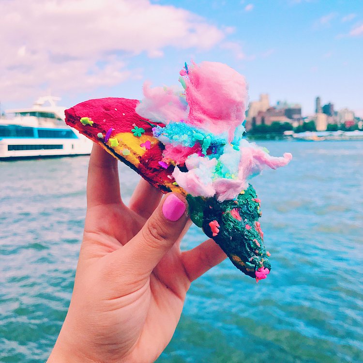 Unicorn pizza exists and it's basically a giant sugar cookie covered in fluffy cotton candy ✨🍕🦄 #cosmobites
