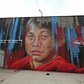 Adnate creates a new piece for The Bushwick Collective