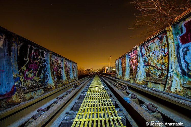 M cabin drawbridge. You can see trash cars parked for Waste Management just on the other side.