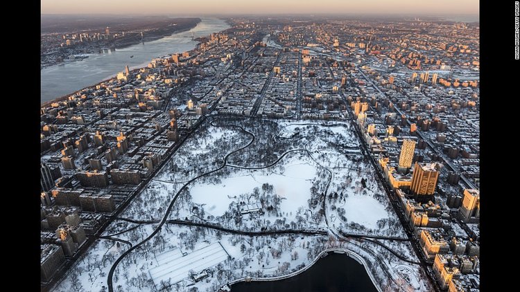 New York's Central Park is covered in snow in January.
