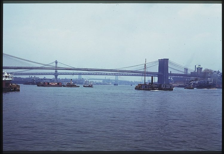 Here, a view of the East River and the majestic Brooklyn Bridge.