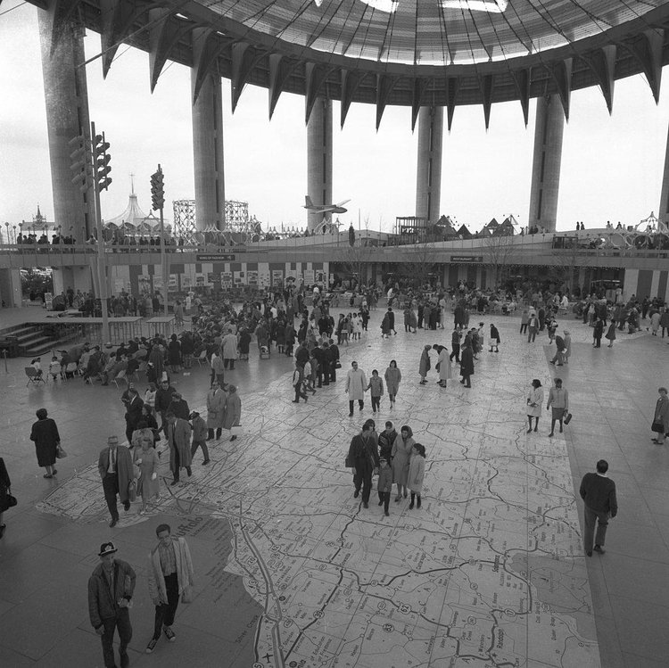 The Tent of Tomorrow in the New York State Pavilion from the 1964-65 World’s Fair. At what is now Flushing Meadows-Corona Park in Queens. On the floor the largest map in the world at the time, a 130-by-166-foot map of New York State.
