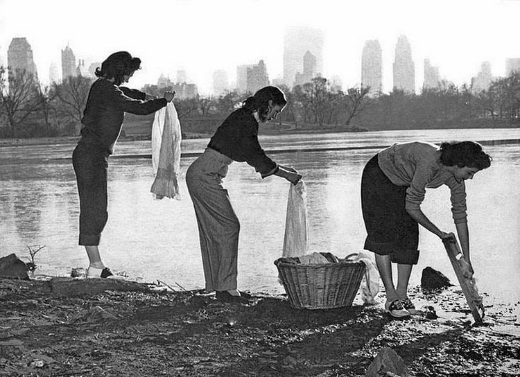 Dry Day, on which New Yorkers were supposed to go shaveless, bathless and laundryless, will probably go down in history as 'Dirty Day' -- but not for these three cuties, Copacabana gals, who observed the water-saving ukase and at the same time stayed next to godliness. They are shown rub-a-dub-dubbing their undies, using the Central Park lake for a washtub, with soap and elbow grease combining with the ancient washboard to complete the job.