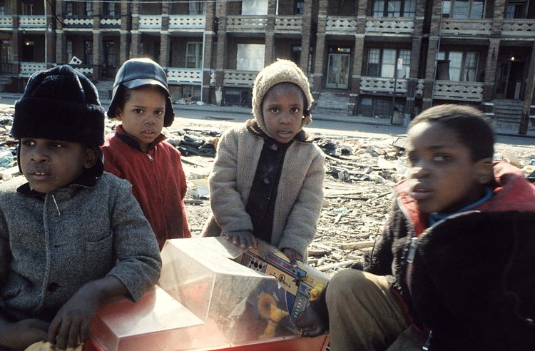 Children playing with a broken toy. Coney Island, Brooklyn, 1971.