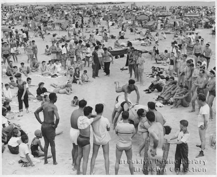 The original caption says that on this date in 1953, 1.3M people visited Coney Island!