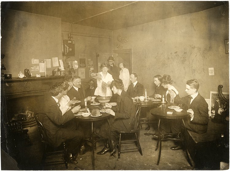 Spaghetti dinner in Grace Godwin's garret, 58 Washington Square South, 1917-1918; photograph by Jessie Tarbox Beals.