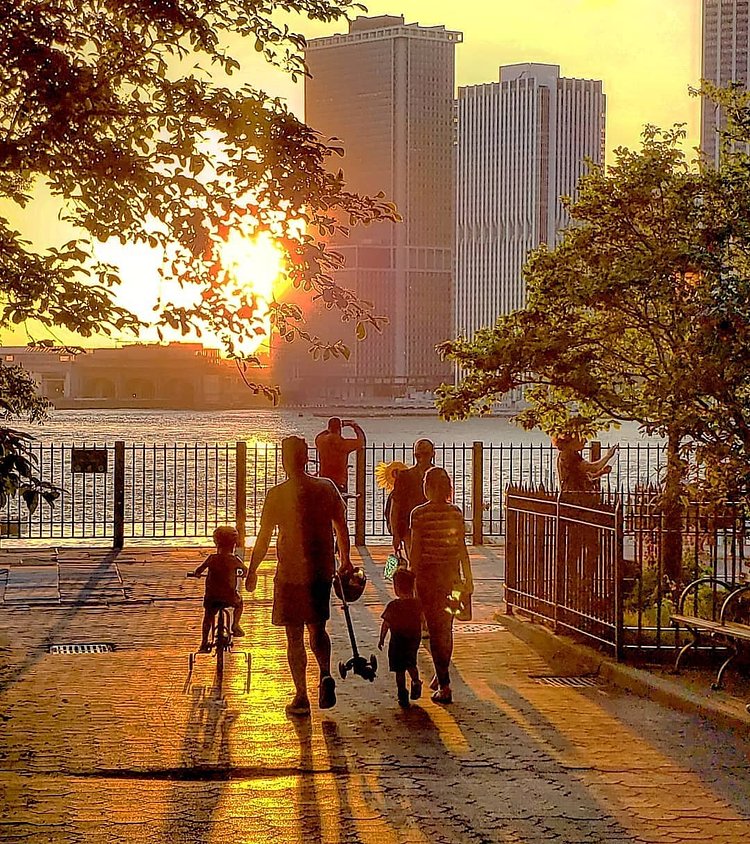 Sunset over Lower Manhattan skyline from Brooklyn Heights