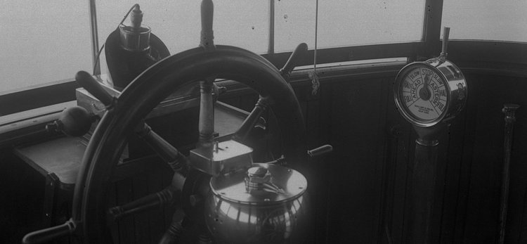 The inside of the wheel house on the ferry boat Dongan Hills, circa 1933. (From the Collection of the Staten Island Museum)