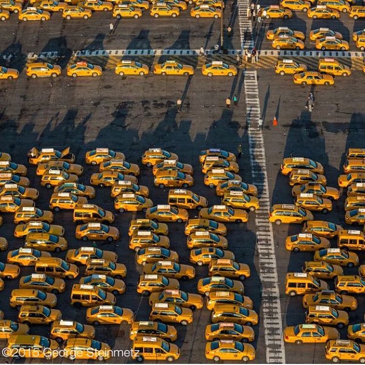 Photograph by George Steinmetz @geosteinmetz / @thephotosociety 
It’s a long wait for a good fare at JFK’s Central Taxi Hold lot.  According to the 2014 Taxi Factbook, people traveling to and from the city’s airports represent 5% of all taxi trips, and about 10% of all passengers arriving at and departing from #JFK use a taxi.