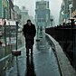 Actor James Dean on a rainy day in Times Square, 1955