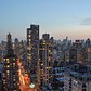 Manhattan skyline from the Upper East Side | Yorkville, New York City, NY // Manhattan skyline from a roof on the Upper East Side.  First Avenue is below and a sunset in the background.  // 3/10/2014