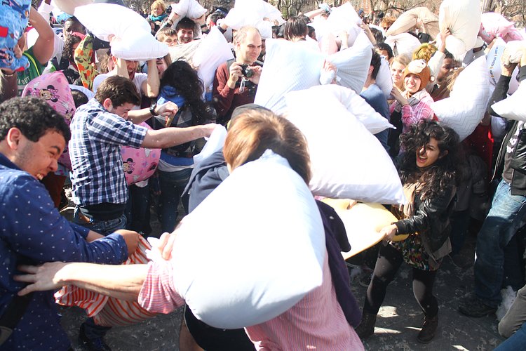 Pillow Warfare | Taken at the 2014 International Pillow Fight Day in Washington Square, New York City.