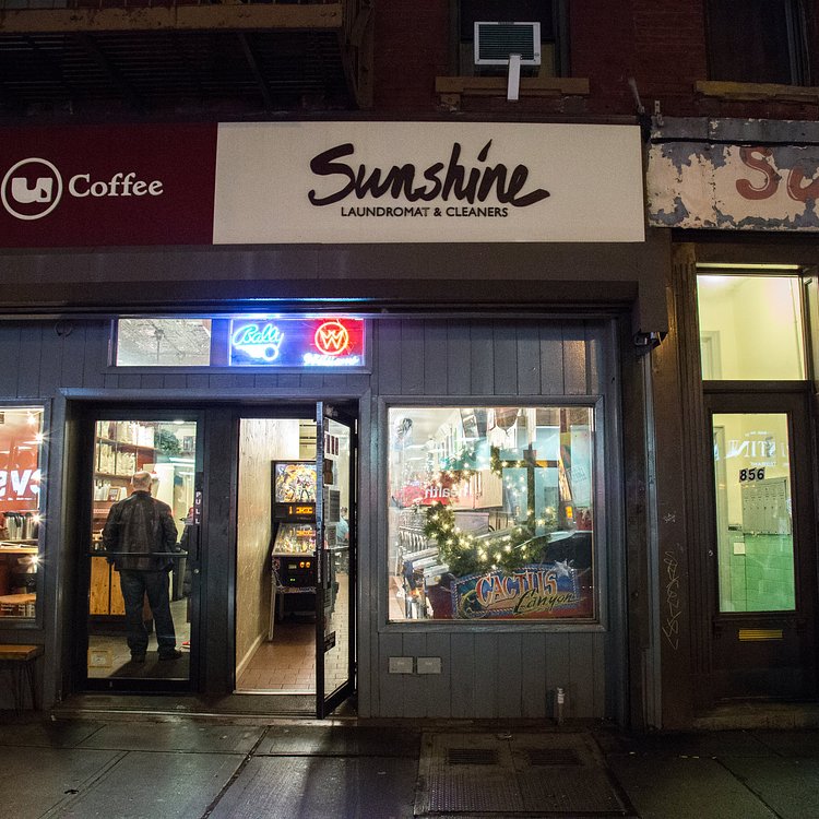 An exterior view of Sunshine Laundromat from Manhattan Avenue.