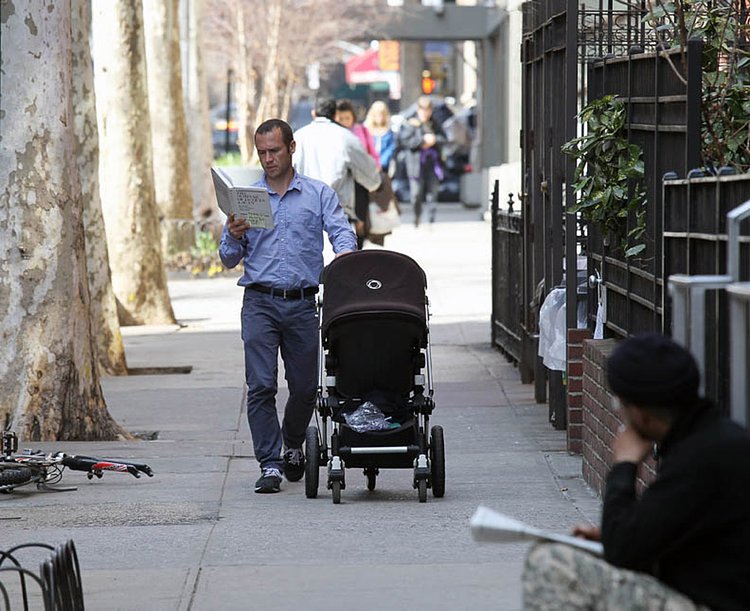 Man with stroller, 12th St., March 12, 2012.