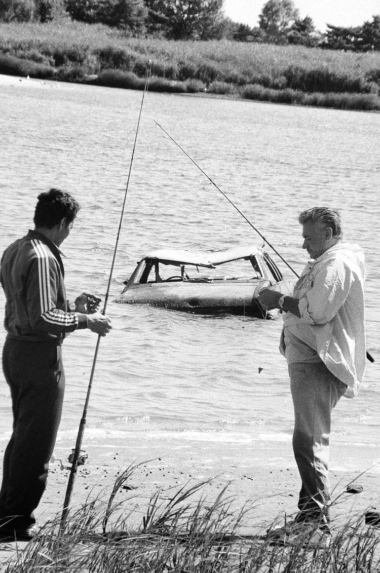 Fishermen at Gerritsen Inlet might find cars abandoned in the waters. Aug. 1, 1990.