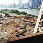 Construction photo showing early earth-moving at the site near the southern end of Roosevelt Island
