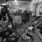 1990's: A firebombed subway token booth at Kingston and Fulton Street lies in ruins following an explosive incident that shook the station in 1995.