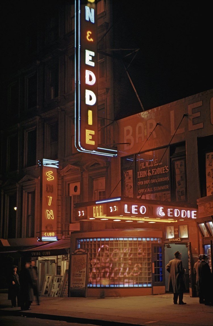 Leon and Eddie’s nightclub on 52nd street in Times Square (midtown) at night with patrons hanging out on the sidewalk 1946