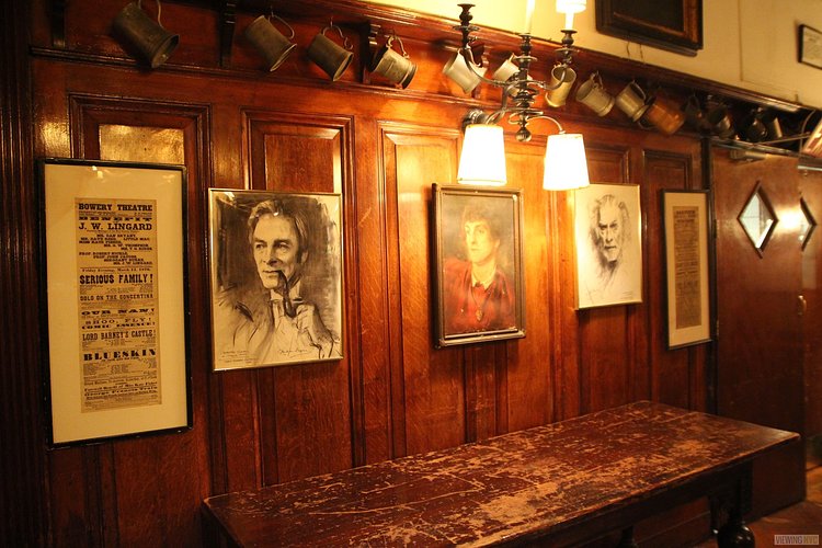 Portraits and Beer Mugs in Dining Room