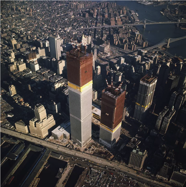 The World Trade Center beginning to rise over New York City in 1971