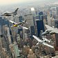 F-16, P-51, A-10 and an F-15 flying above New York City