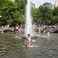 Girls swimming on a hot day in Washington Square Park.