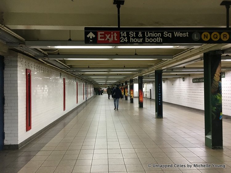 Along one corridor between the 14th Street and 17th Street entrances are narrow openings, with printed fragments of the station’s history, like telephone cables and names of former transit workers.