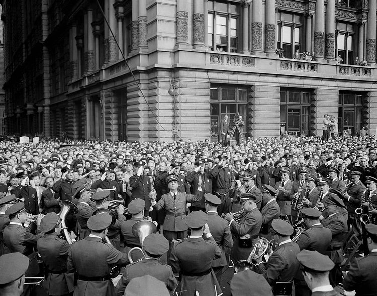 A police band plays for the crowd