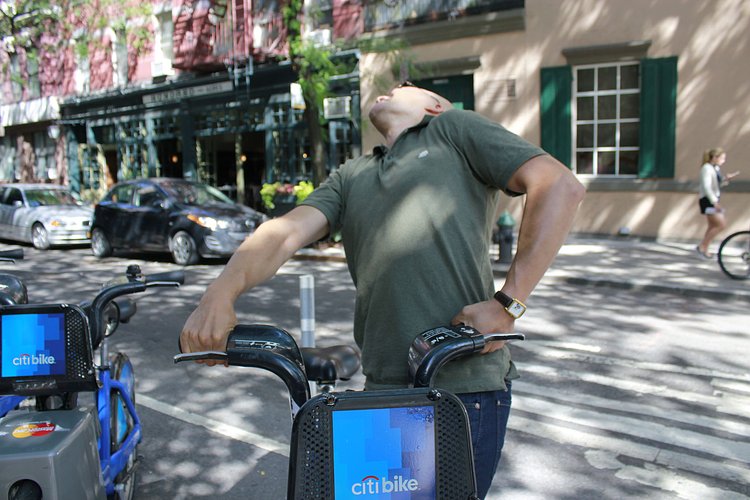 Man Trying to Get a Citibike Out of a Broken Dock | You can use this photo for non-commercial purposes if you give credit, under this <a href="https://creativecommons.org/licenses/by-nc/3.0/us/" rel="nofollow">Creative Commons license</a>. For-profit media organizations also may use this, but as editorial content only (as illustrations for stories, for example, but not as advertising). Credit must read: Louise Ma / WNYC

We'd love to know if you're using this photo - send us an email (jkeefe@wnyc.org)!