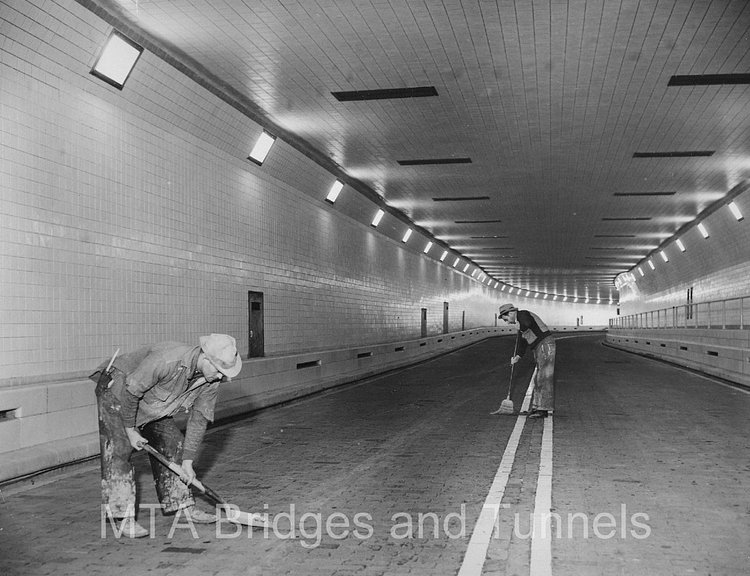When the tunnel first opened, the ground was made of brick. It's since been replaced with asphalt.