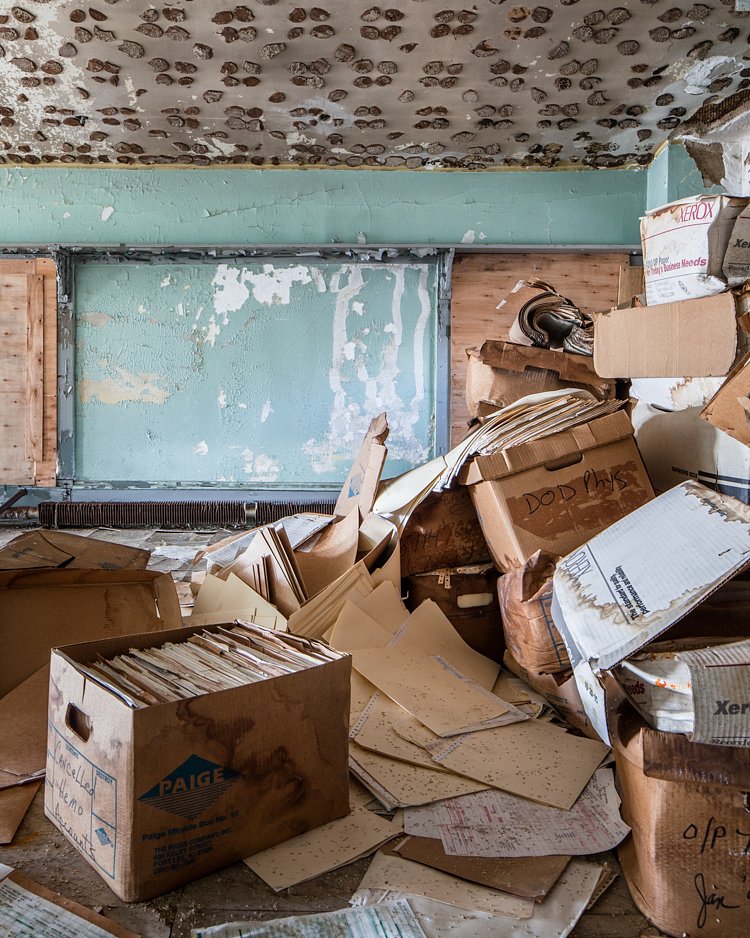Mouldering files in the south wing.