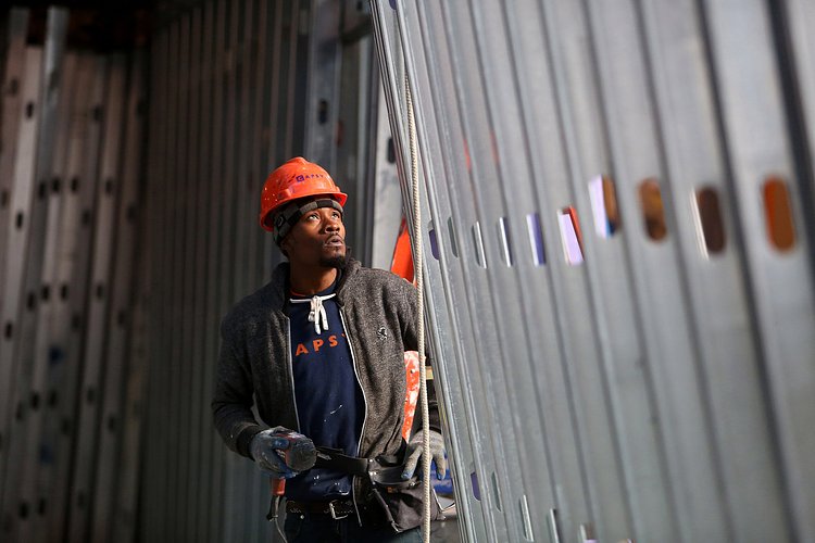 Walls are assembled in a separate area of the plant.