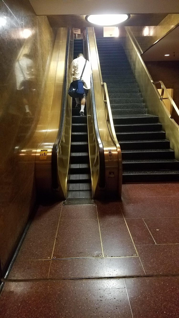 This really narrow escalator at 30 Rockefeller Center