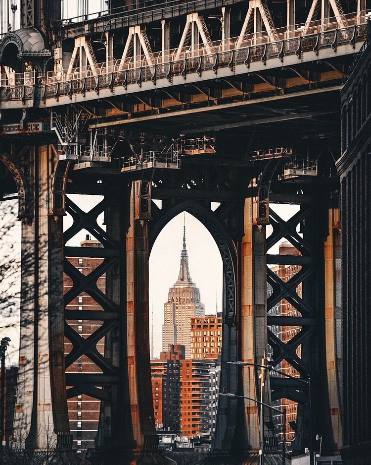 Empire State Building seen through Manhattan Bridge from DUMBO, Brooklyn