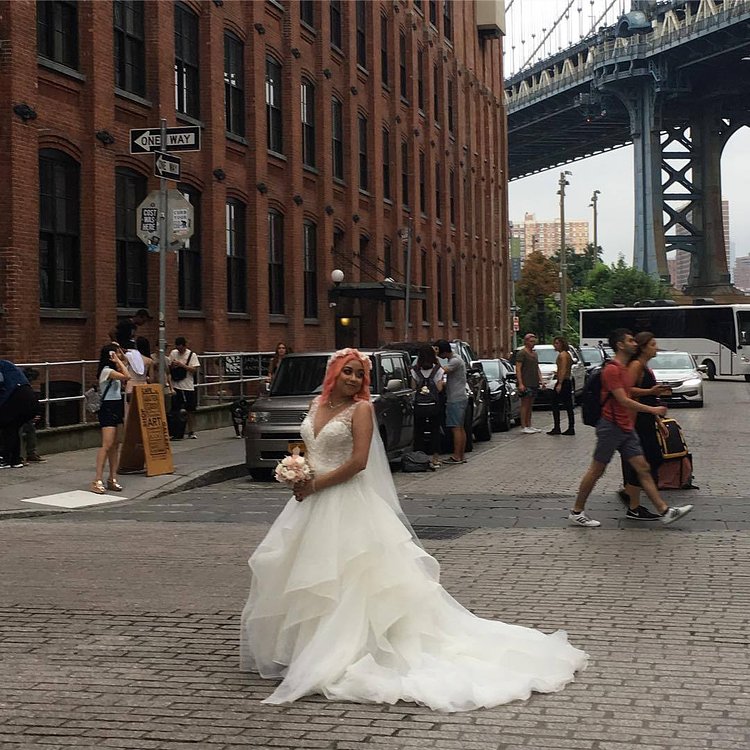 Can't eclipse the Bride with solar orange hair dye, and matching accent flowers she did buy #nicetouch