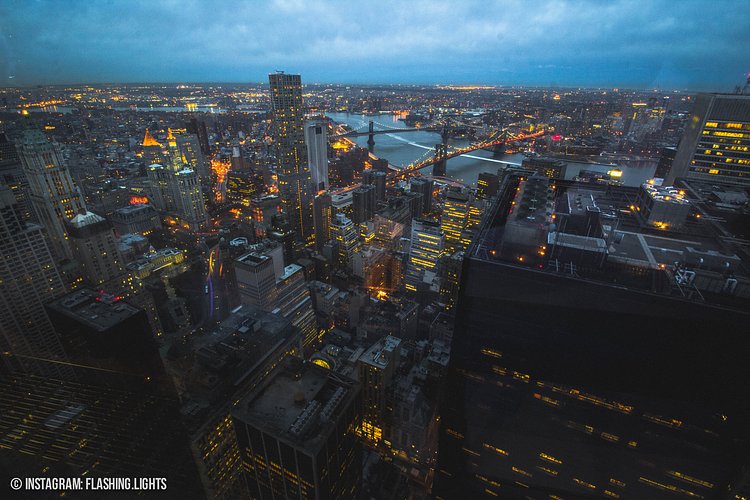 This was shot from one of the top floors of 4 World Trade Center. The view overlooks NY by Gehry and the Brooklyn and Manhattan Bridges. 