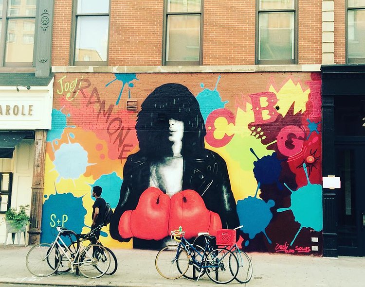 Completed @ramones mural right across from former CBGB's on Bowery and Bleecker painted with @crashone the gloves represent the struggle Joey and the ramones endured to achieve success they performed 2,263 times virtually touring non-stop for 22 years . Mural organised by  @thelisaprojectnyc @lomanartfest #joeyramone #solus #crashone #lisaproject