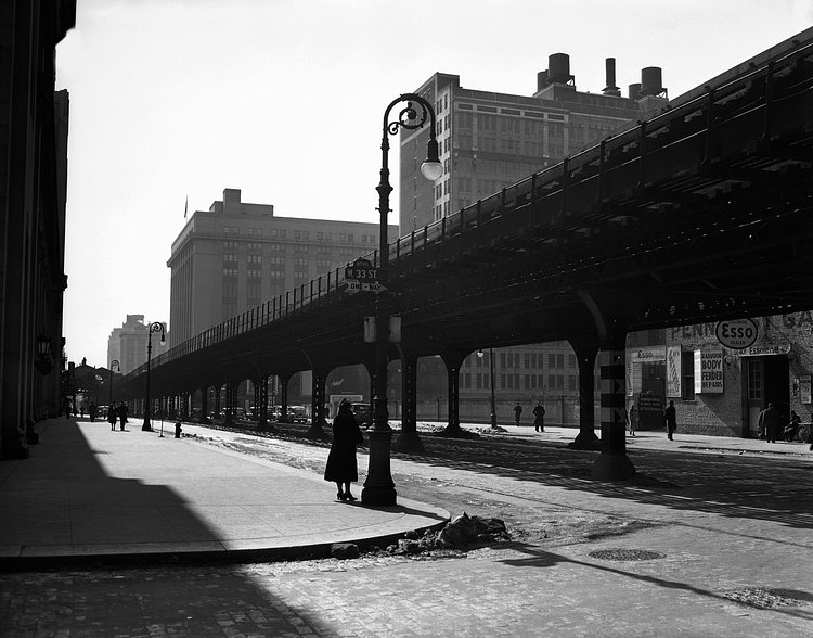 The Ninth Avenue "El", or elevated, tracks are seen looking south at 33rd Street in New York, Feb. 22, 1940. The transit commission authorized condemnation of the structure.